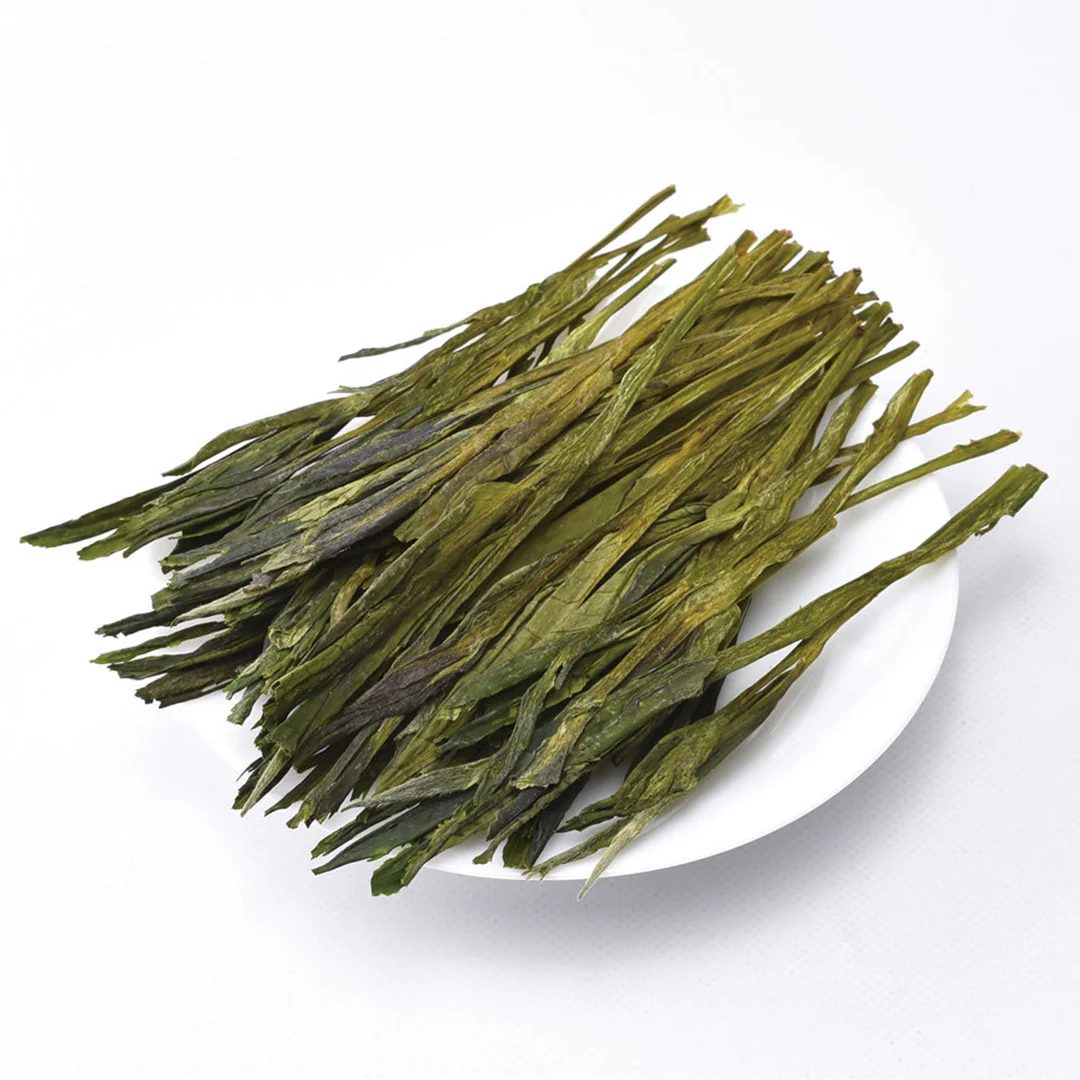 Taiping Houkui flat-leaf green tea brewed in glassware for Dubai cafes